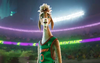 Szenenbild aus G.O.A.T.: Bock auf große Sprünge: Eine anthropomorphe Ziege steht in einem Basketballstadion. Das Tier trägt ein grünes Basketballtrikot mit orangefarbenen Akzenten und der Nummer 0 auf der Vorderseite. Im Hintergrund sind leuchtende Werbebanner und Zuschauertribünen zu sehen, die in bunten Farben beleuchtet sind. [erstellt mit KI]